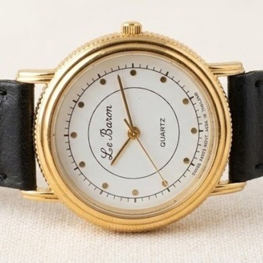 Le Baron NOS Quartz Watch Gold Tone White Dial Leather Strap Swiss Parts Movt